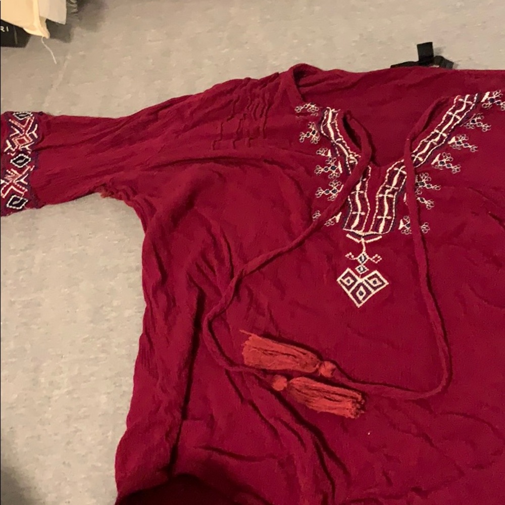 Red flowing top will bell sleeves